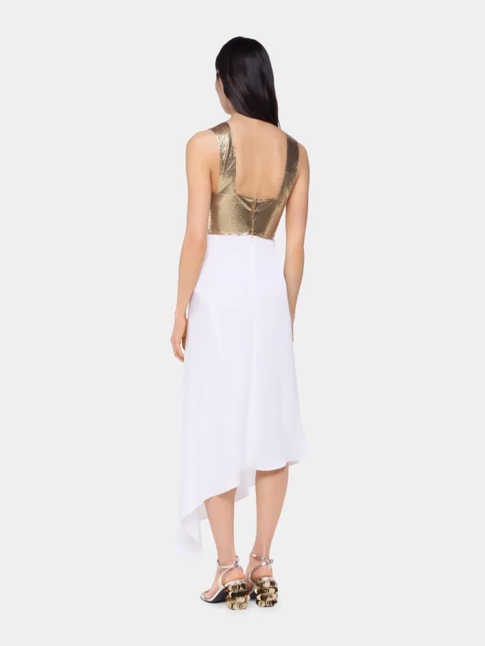 Asymmetrisk klänning i nät och satin
