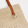 Beige raffia-tygväska med logotyp