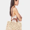 Beige tygväska i raffia