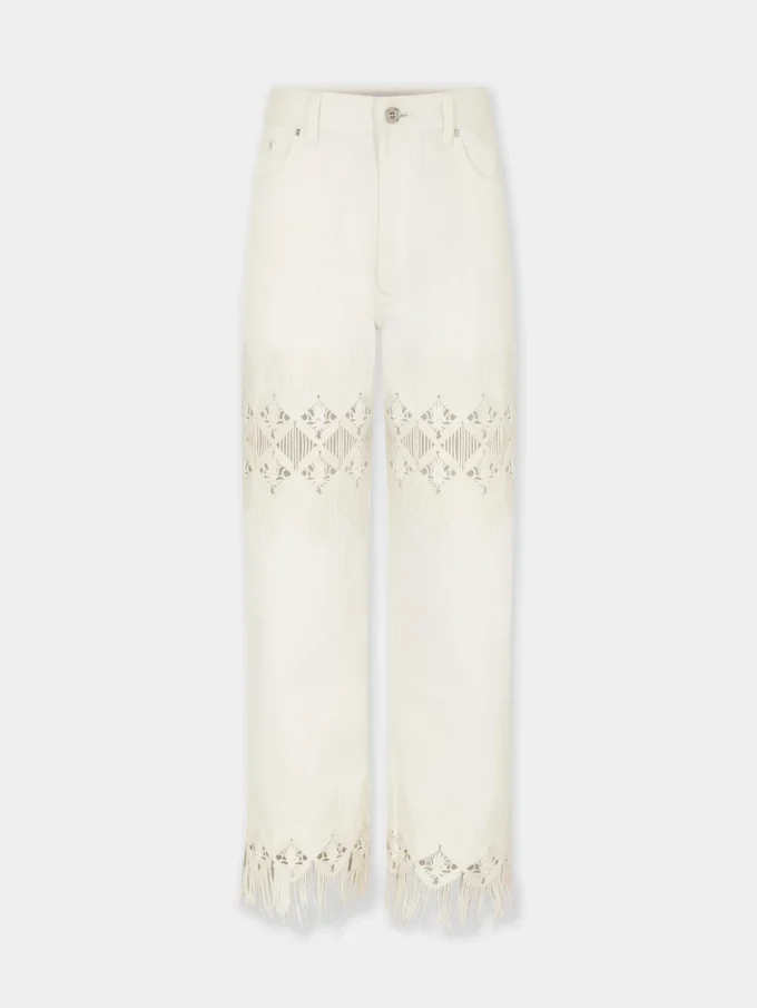 Byxor i denim med broderade detaljer