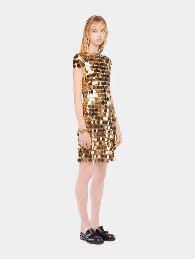 Den ikoniska guldklänningen Sparkle Disc Den ikoniska guldklänningen Sparkle Disc