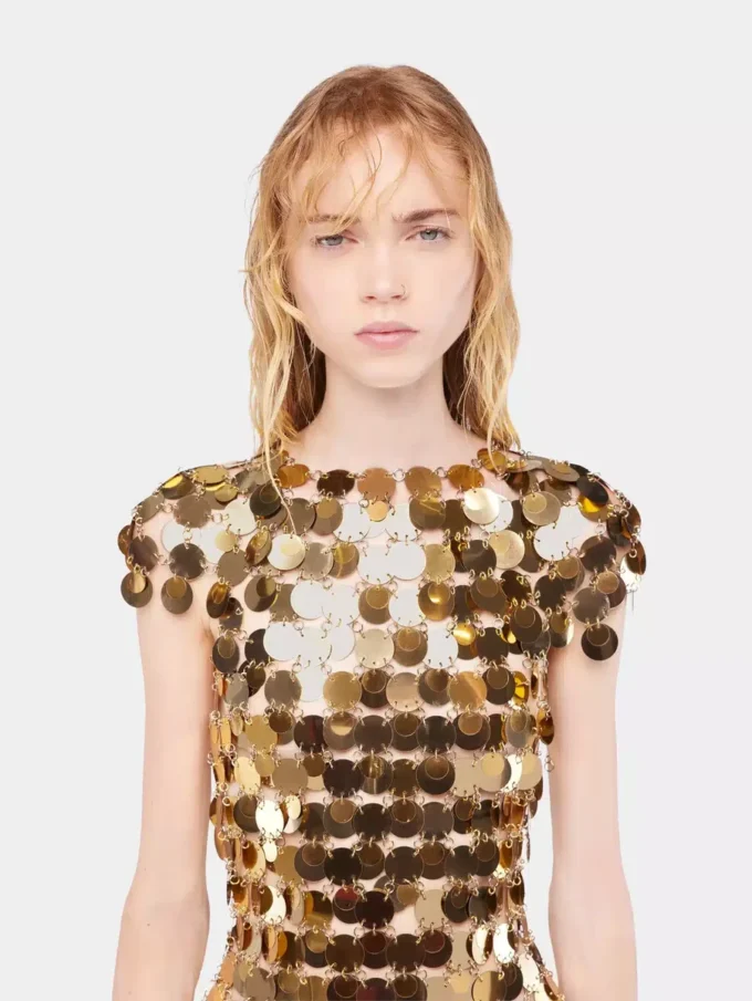 Den ikoniska guldklänningen Sparkle Disc Den ikoniska guldklänningen Sparkle Disc