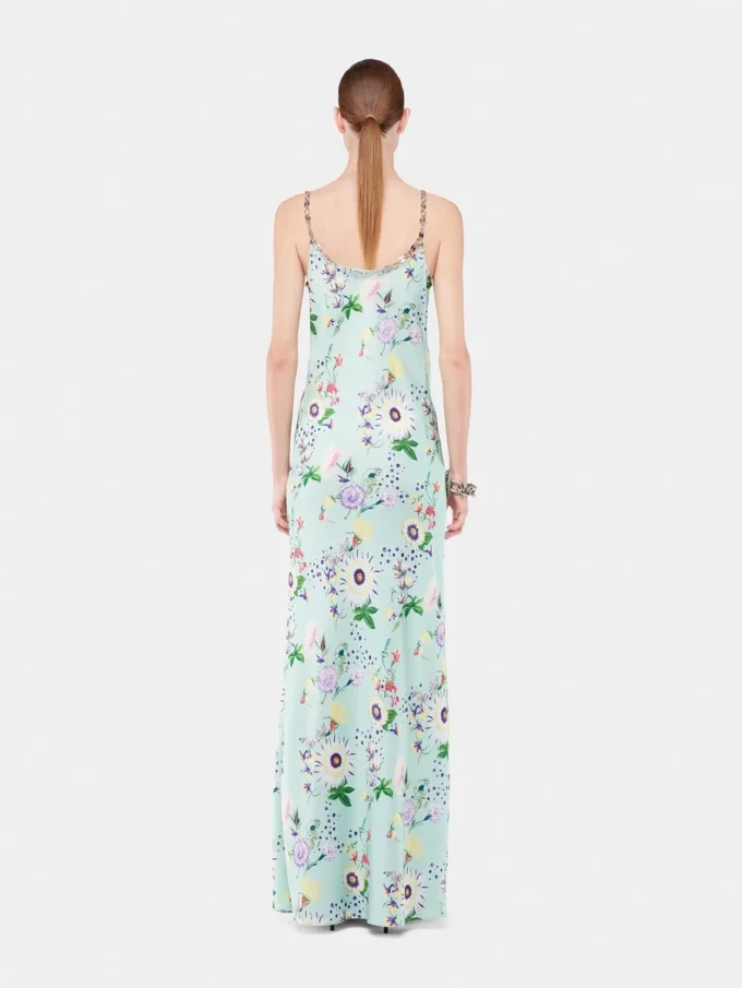 Klänning med blommönster och kedjedetaljer