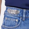 Signaturjeans med 1969-metallskivor