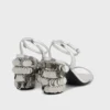 Silversandaler med glittrande klackar