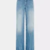 Utställda jeans prydda med 1969-skivor