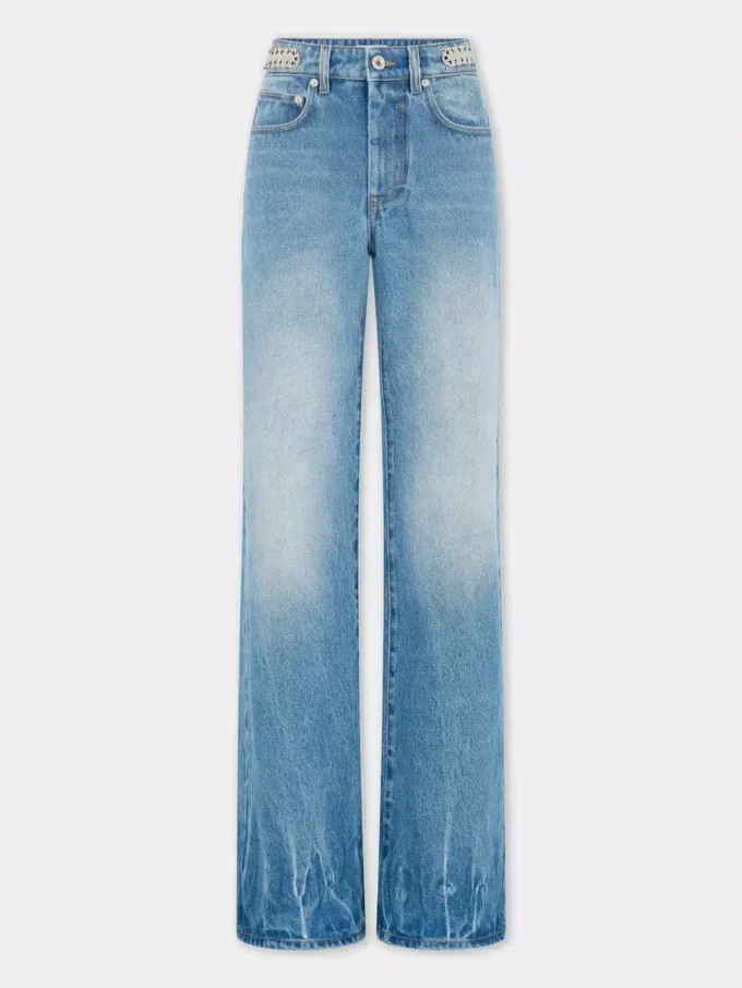 Utställda jeans prydda med 1969-skivor