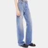 Utställda jeans prydda med 1969-skivor
