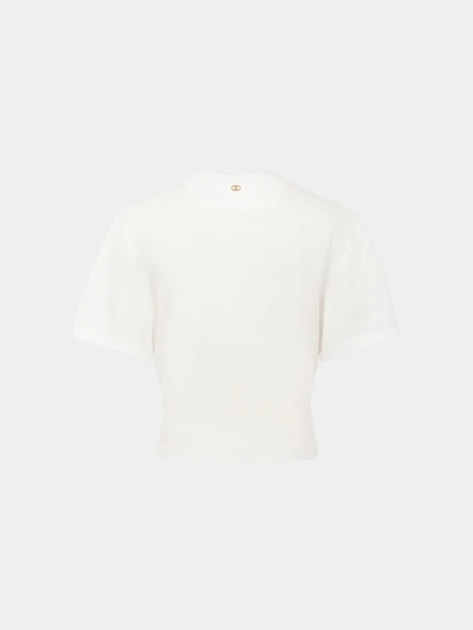 Vit t-shirt med piercing